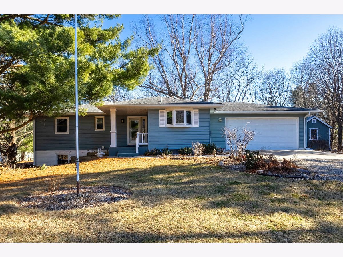 Homes For Sale Hickory Hills Blue Grass Iowa, 7 Sandpiper Drive